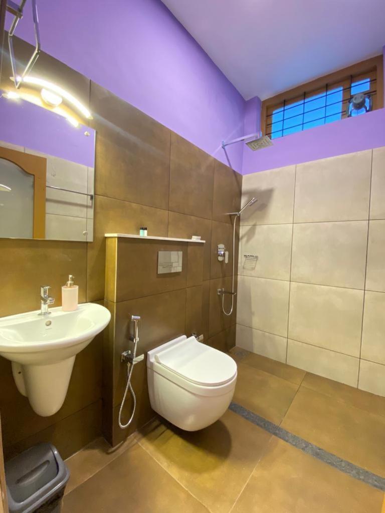Munnar Blue Mist Bed and Breakfast Δωμάτιο φωτογραφία